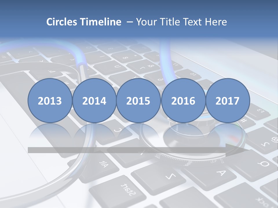 A Stethoscope Laying On Top Of A Laptop Keyboard PowerPoint Template