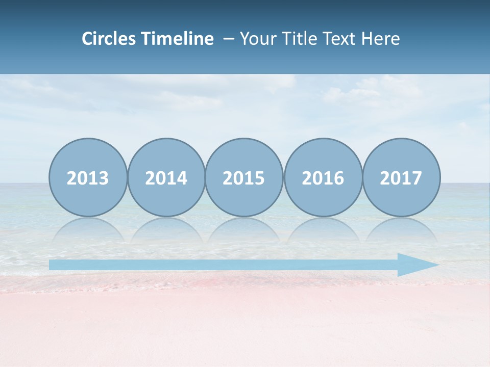 A Sandy Beach With A Blue Sky And Ocean In The Background PowerPoint Template