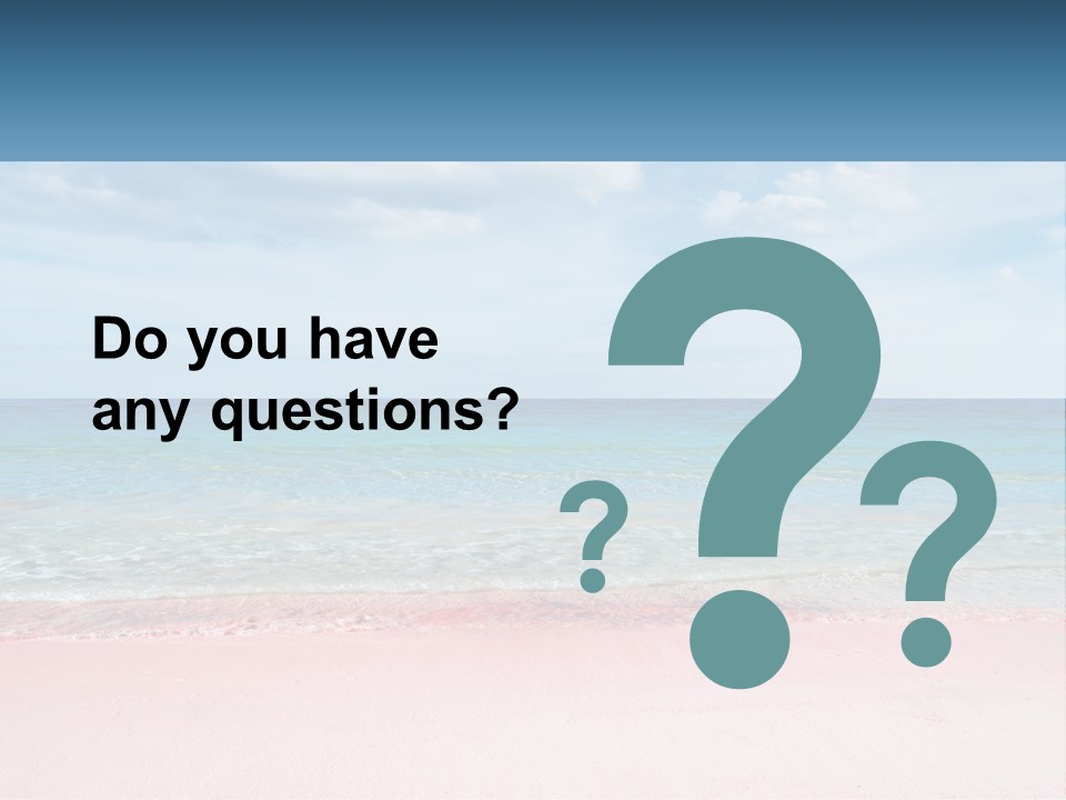 A Sandy Beach With A Blue Sky And Ocean In The Background PowerPoint Template