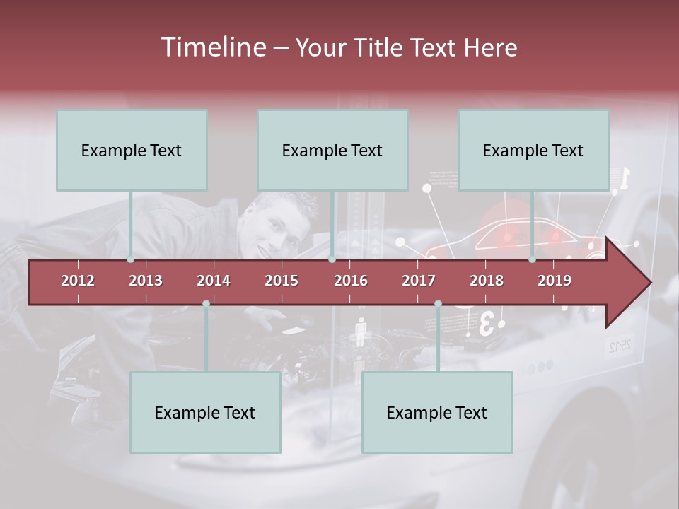 A Man Working On A Car In A Garage PowerPoint Template