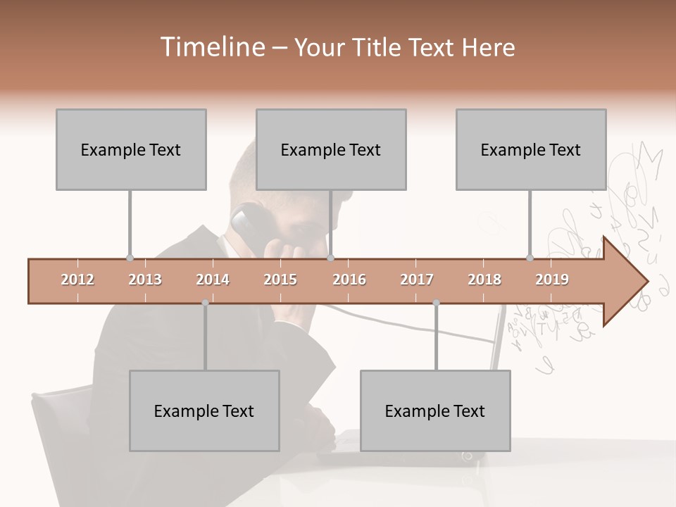 A Man Talking On A Phone While Using A Laptop PowerPoint Template