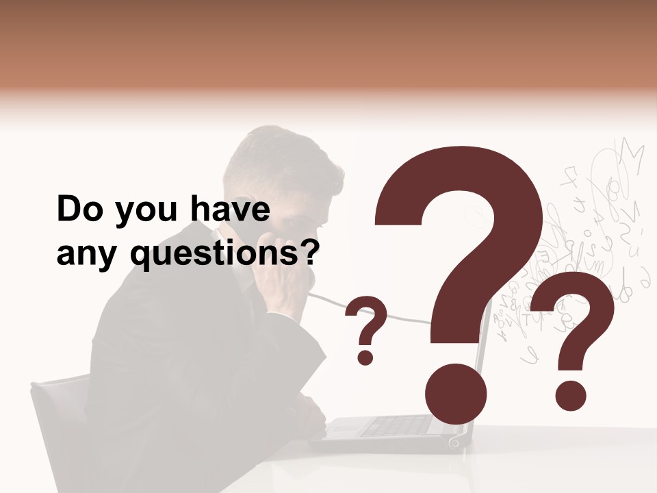 A Man Talking On A Phone While Using A Laptop PowerPoint Template