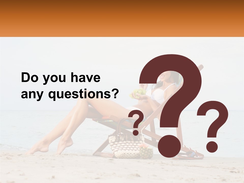 A Woman Sitting In A Chair On The Beach PowerPoint Template