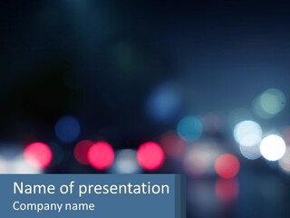 A Blurry Image Of A City Street At Night PowerPoint Template