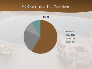 An Aerial View Of A Pool With Chairs Around It PowerPoint Template