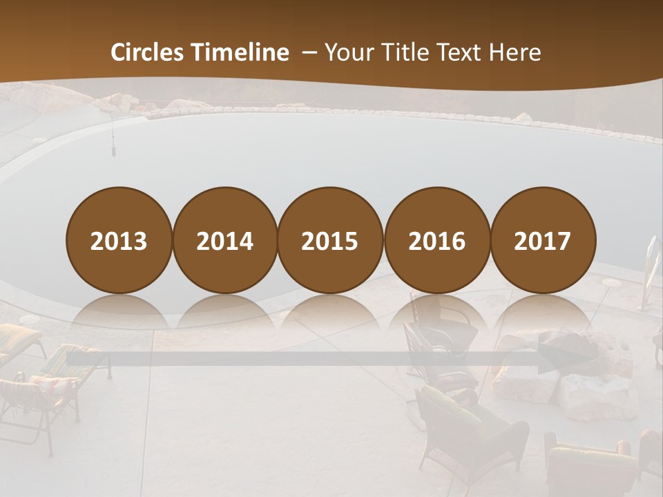 An Aerial View Of A Pool With Chairs Around It PowerPoint Template