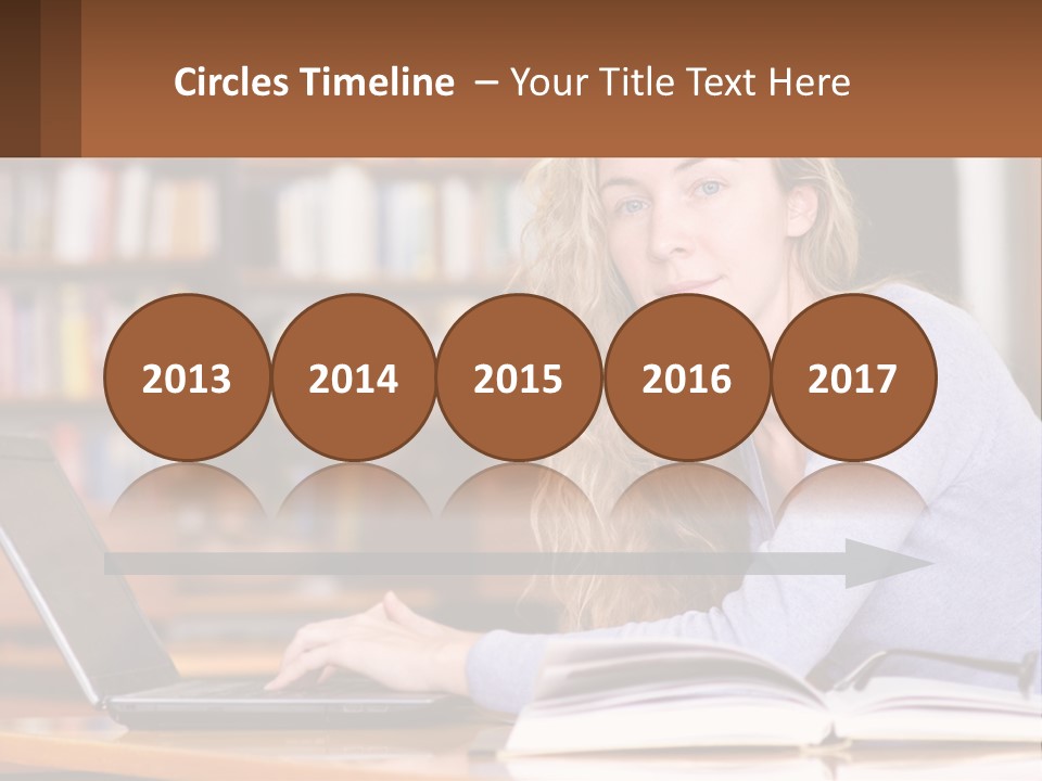 A Woman Sitting At A Table With A Book In Front Of Her PowerPoint Template