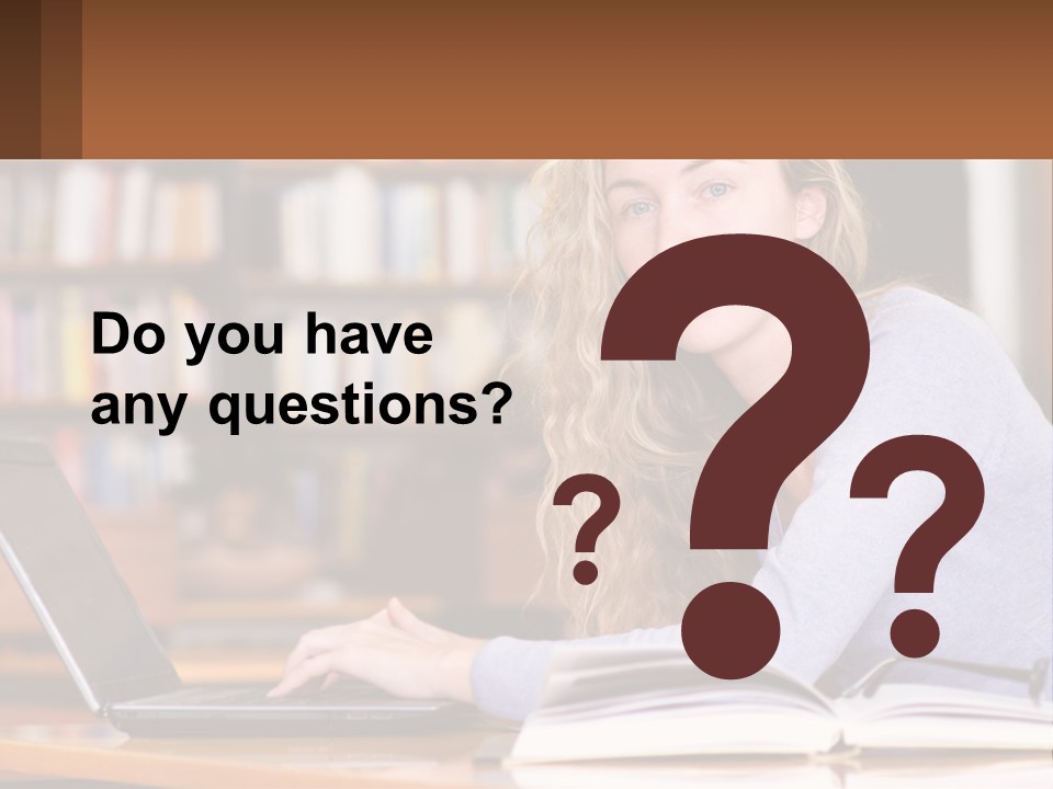 A Woman Sitting At A Table With A Book In Front Of Her PowerPoint Template