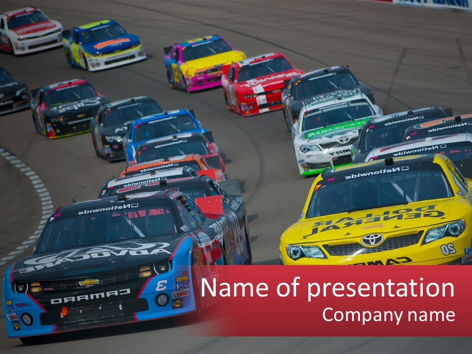 A Group Of Cars Driving Down A Race Track PowerPoint Template
