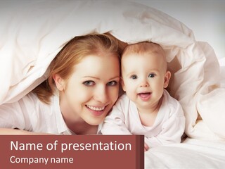 A Woman Holding A Baby Under A Blanket PowerPoint Template