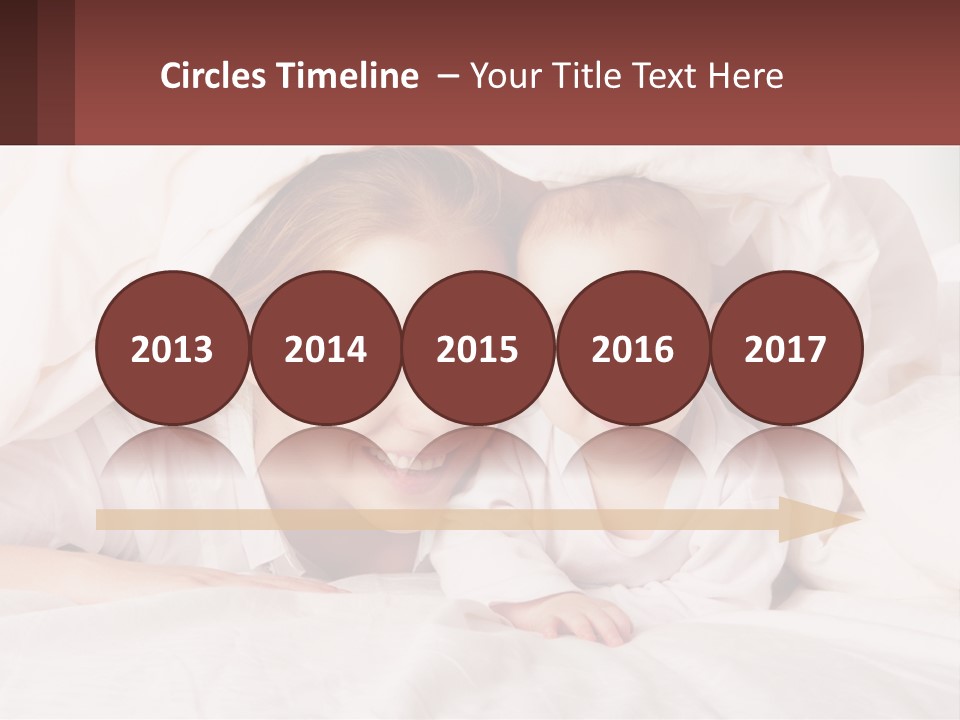 A Woman Holding A Baby Under A Blanket PowerPoint Template