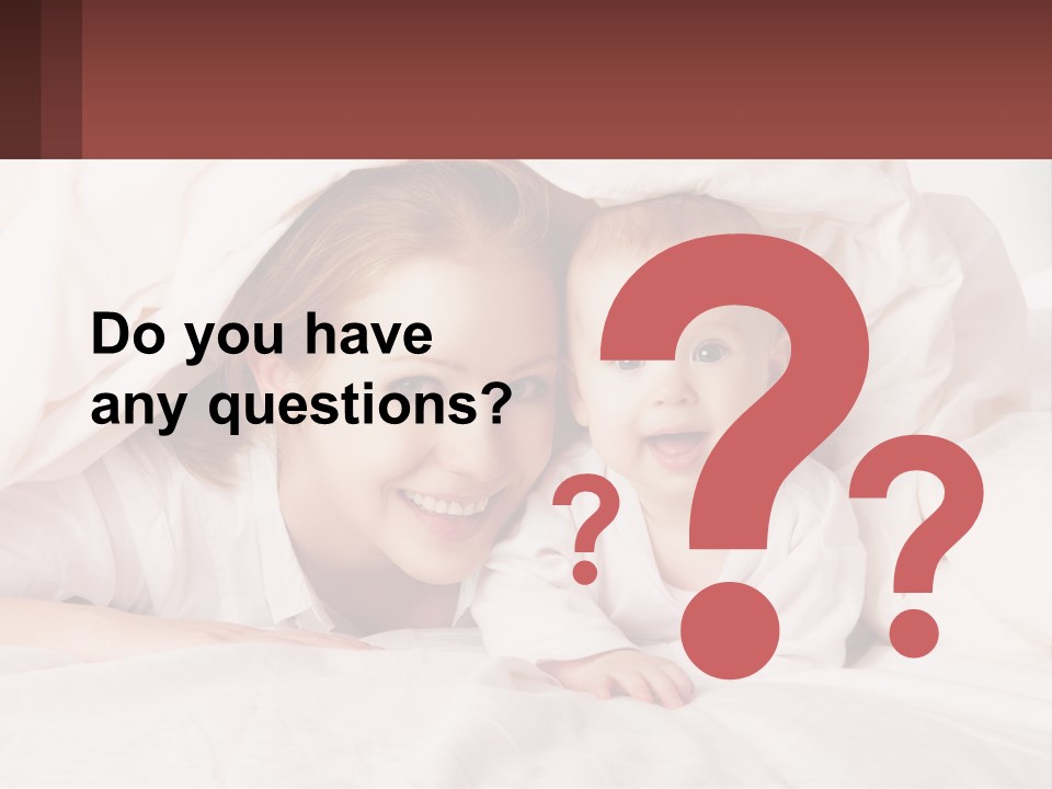 A Woman Holding A Baby Under A Blanket PowerPoint Template