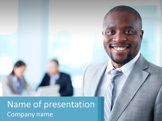 A Man In A Suit Is Smiling For The Camera PowerPoint Template
