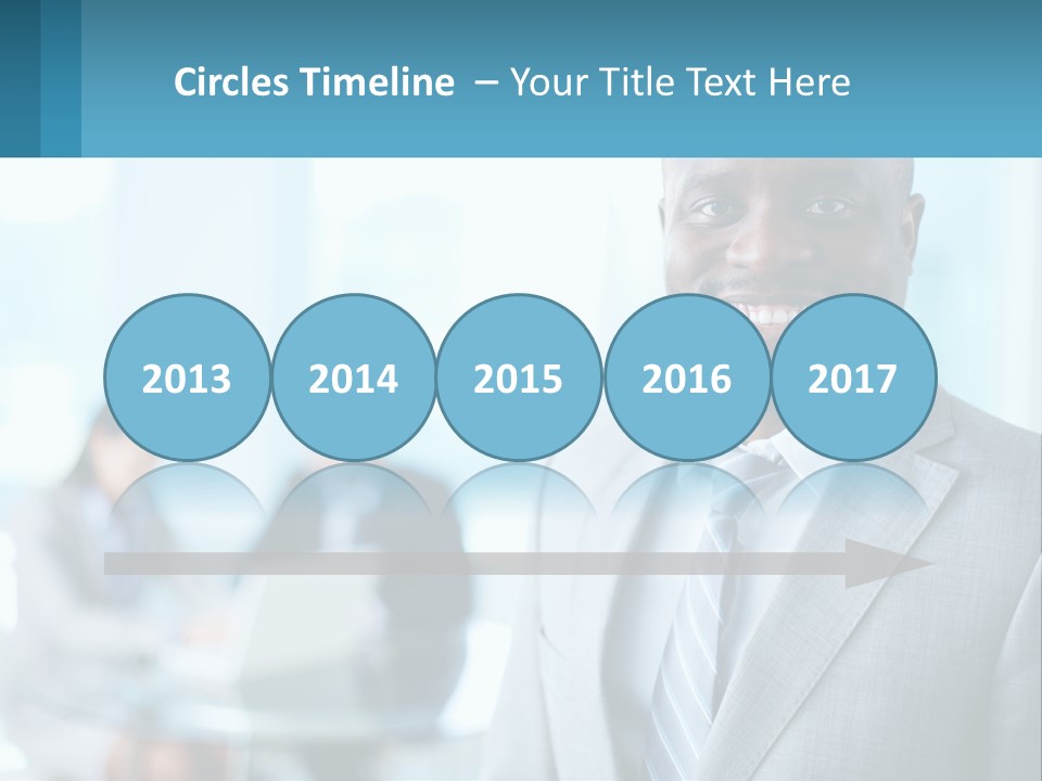 A Man In A Suit Is Smiling For The Camera PowerPoint Template