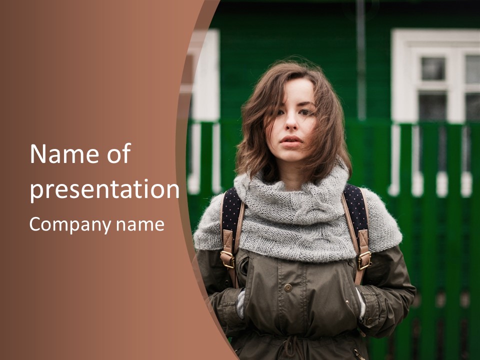 A Woman Standing In Front Of A Green Building PowerPoint Template