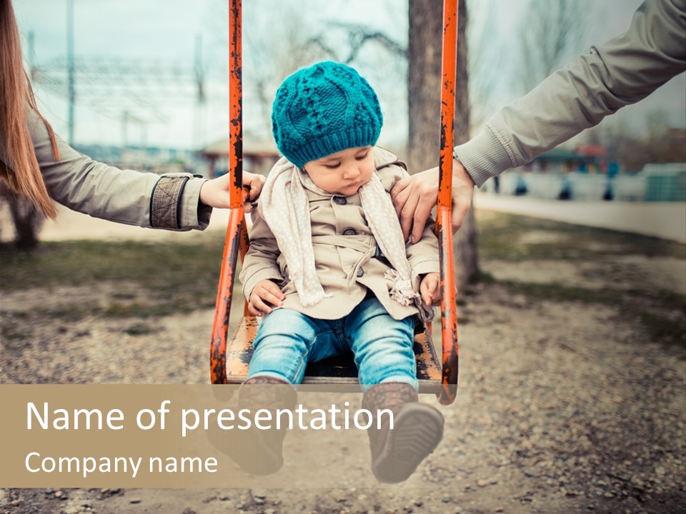 A Woman Holding A Child On A Swing PowerPoint Template