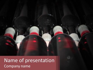 A Bunch Of Wine Bottles Sitting In A Row PowerPoint Template