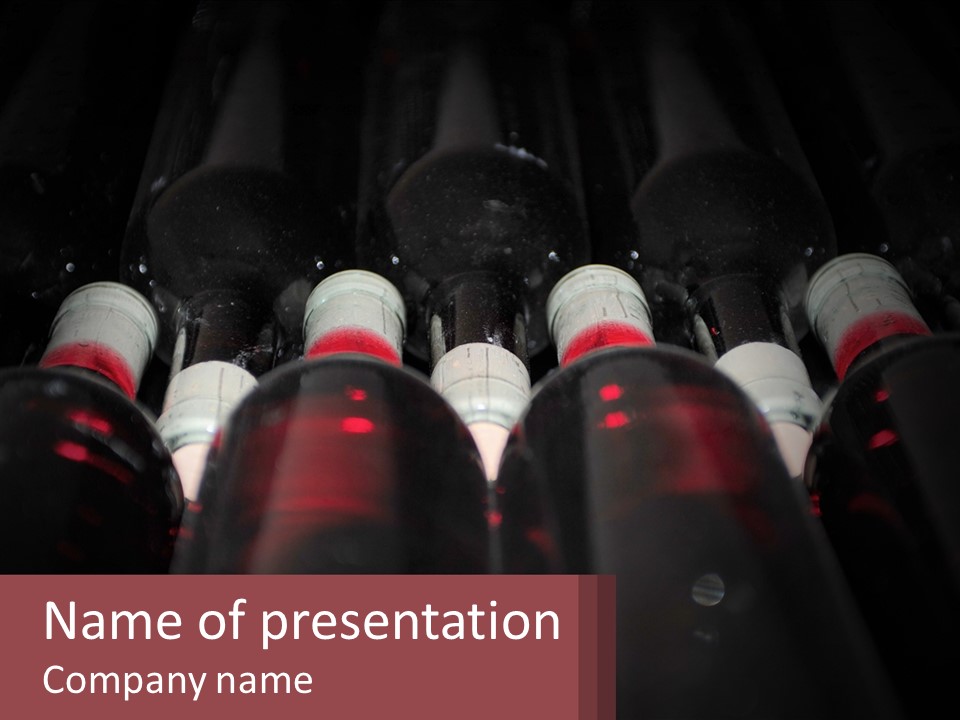 A Bunch Of Wine Bottles Sitting In A Row PowerPoint Template