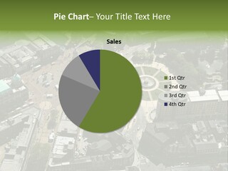 An Aerial View Of A City With Lots Of Buildings PowerPoint Template