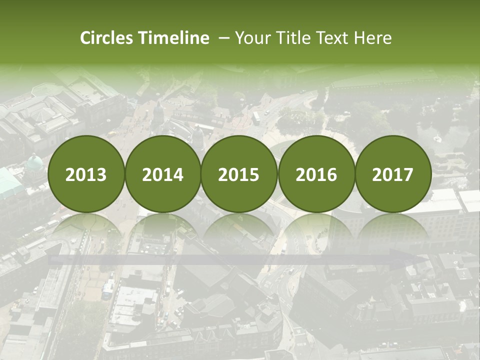 An Aerial View Of A City With Lots Of Buildings PowerPoint Template
