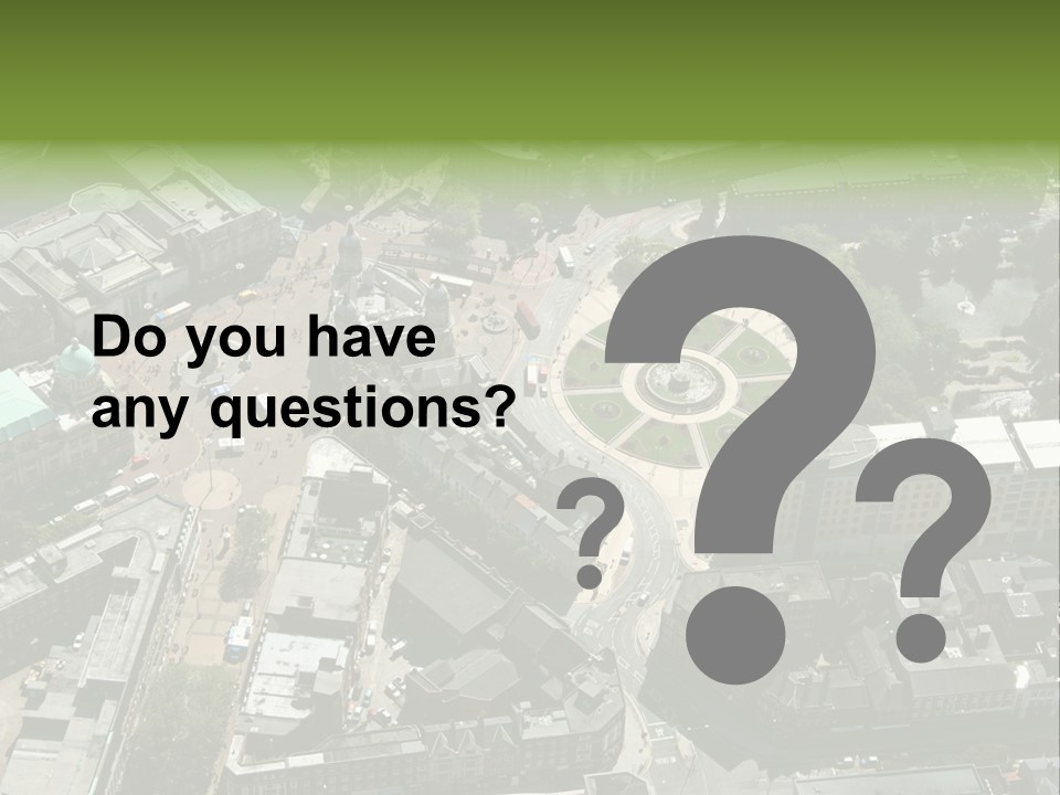 An Aerial View Of A City With Lots Of Buildings PowerPoint Template