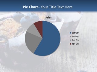 A Muffin With Blueberries On A Wooden Table PowerPoint Template
