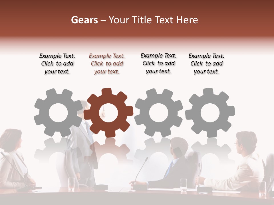 A Group Of People Sitting Around A Conference Table PowerPoint Template
