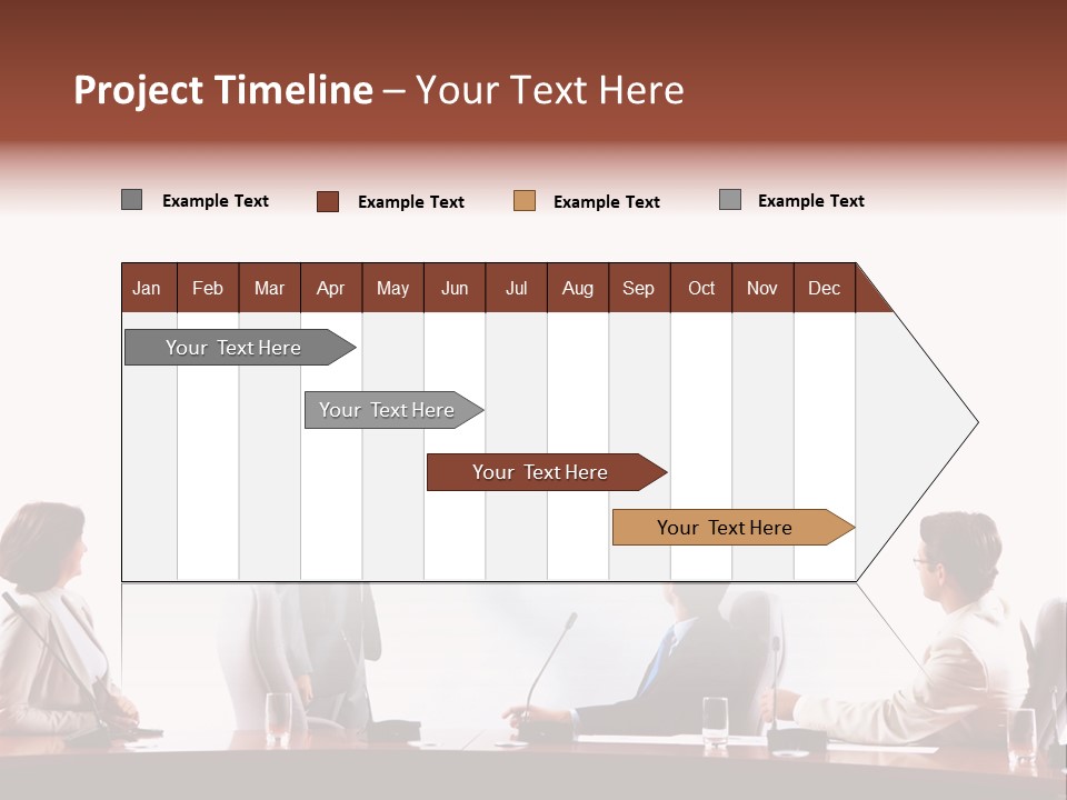 A Group Of People Sitting Around A Conference Table PowerPoint Template