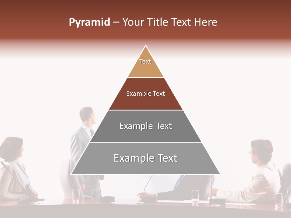 A Group Of People Sitting Around A Conference Table PowerPoint Template
