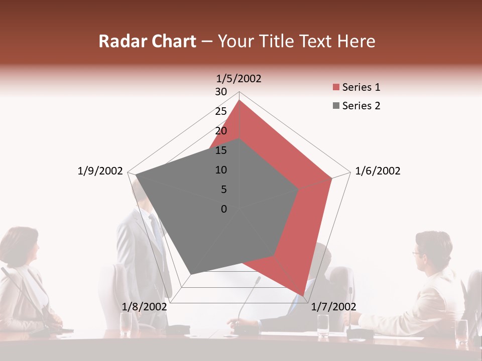 A Group Of People Sitting Around A Conference Table PowerPoint Template