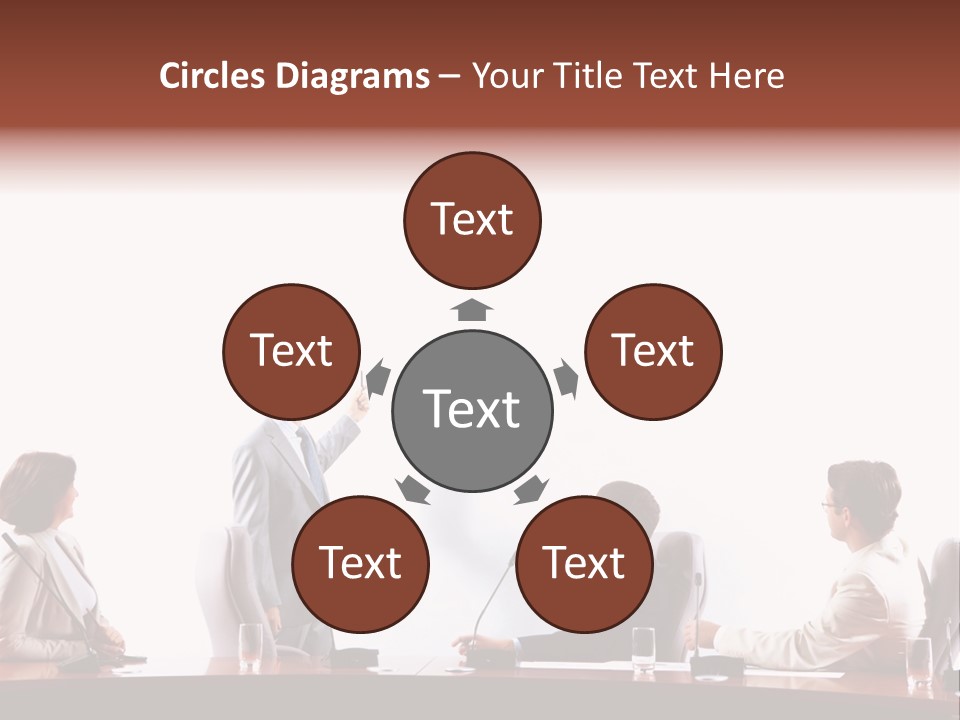 A Group Of People Sitting Around A Conference Table PowerPoint Template