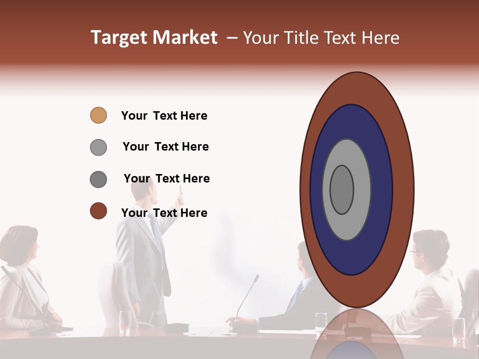 A Group Of People Sitting Around A Conference Table PowerPoint Template