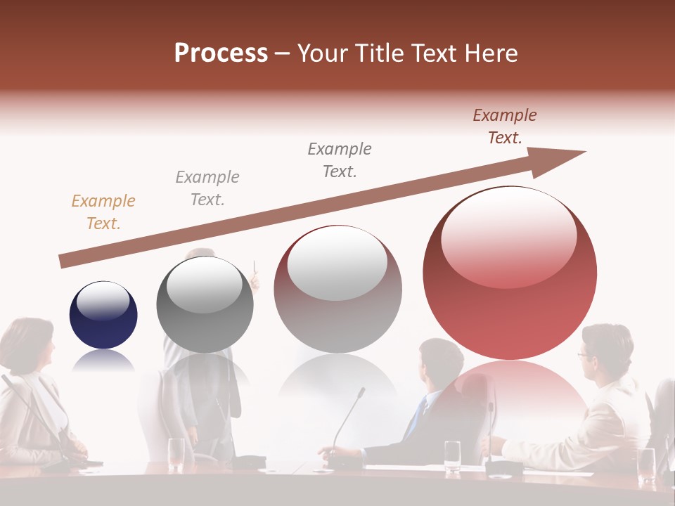 A Group Of People Sitting Around A Conference Table PowerPoint Template