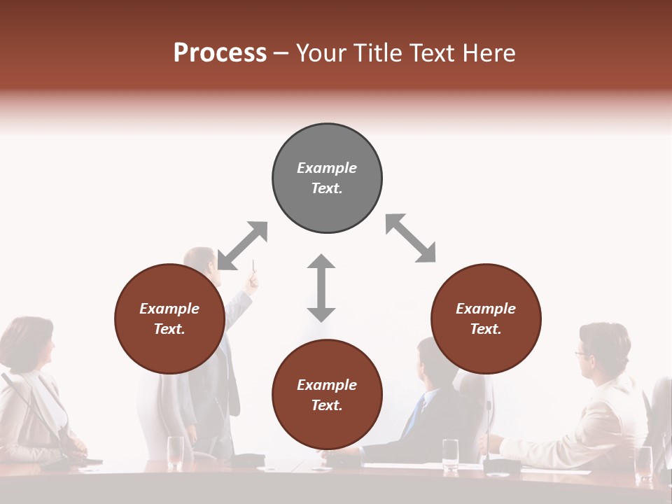 A Group Of People Sitting Around A Conference Table PowerPoint Template