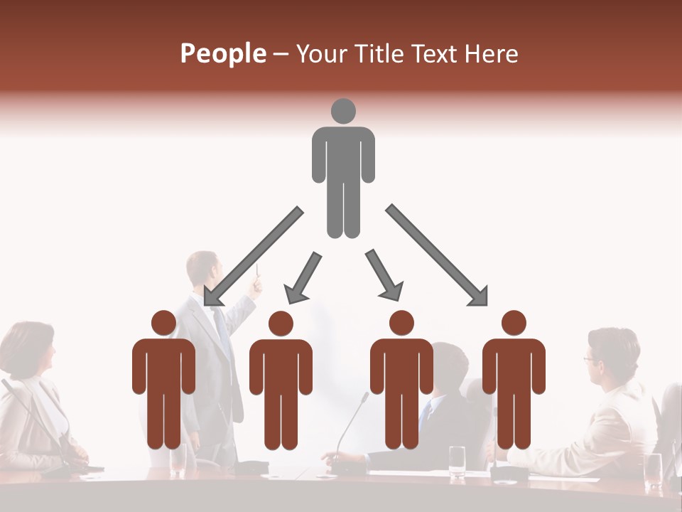 A Group Of People Sitting Around A Conference Table PowerPoint Template