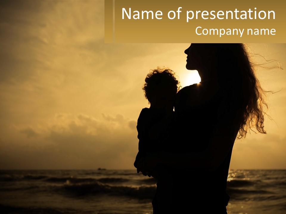 A Silhouette Of A Woman Holding A Child On A Beach PowerPoint Template