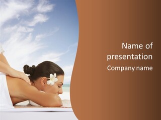 A Woman Laying Down On The Beach With A Flower In Her Hair PowerPoint Template