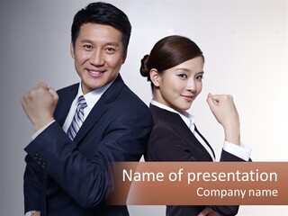 A Man And A Woman Are Posing For A Picture PowerPoint Template