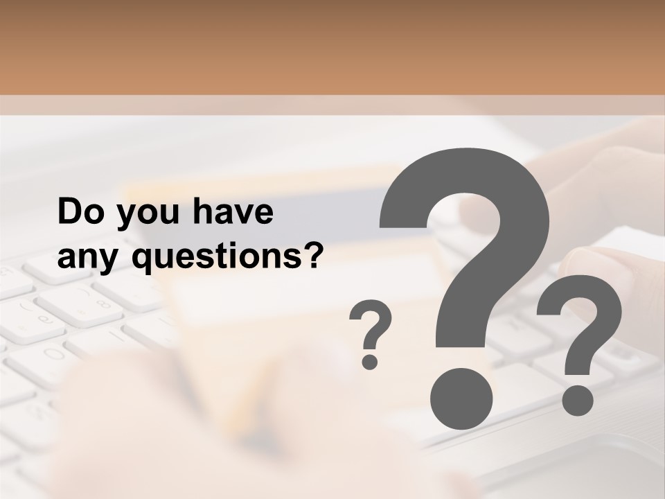 A Person Typing On A Laptop With A Credit Card PowerPoint Template
