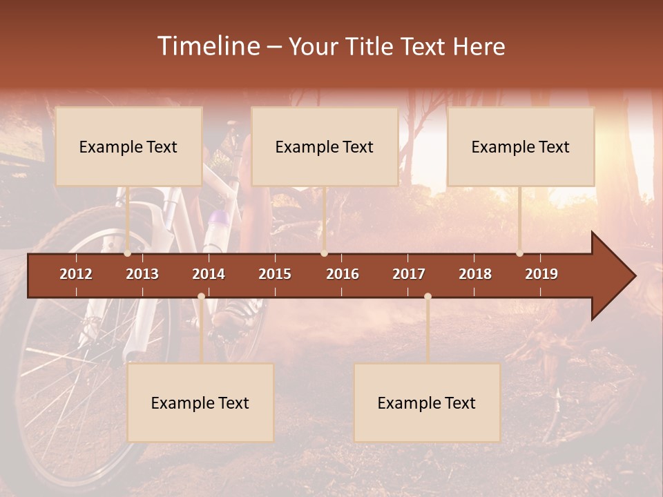 A Person Riding A Bike On A Dirt Road PowerPoint Template