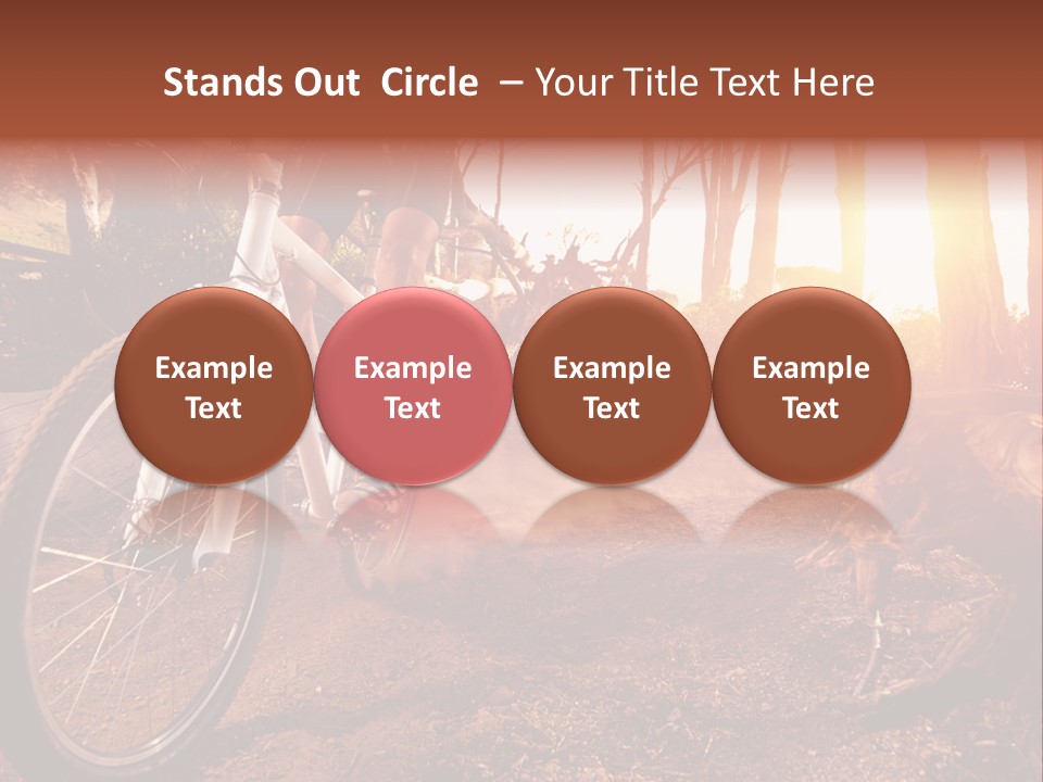A Person Riding A Bike On A Dirt Road PowerPoint Template