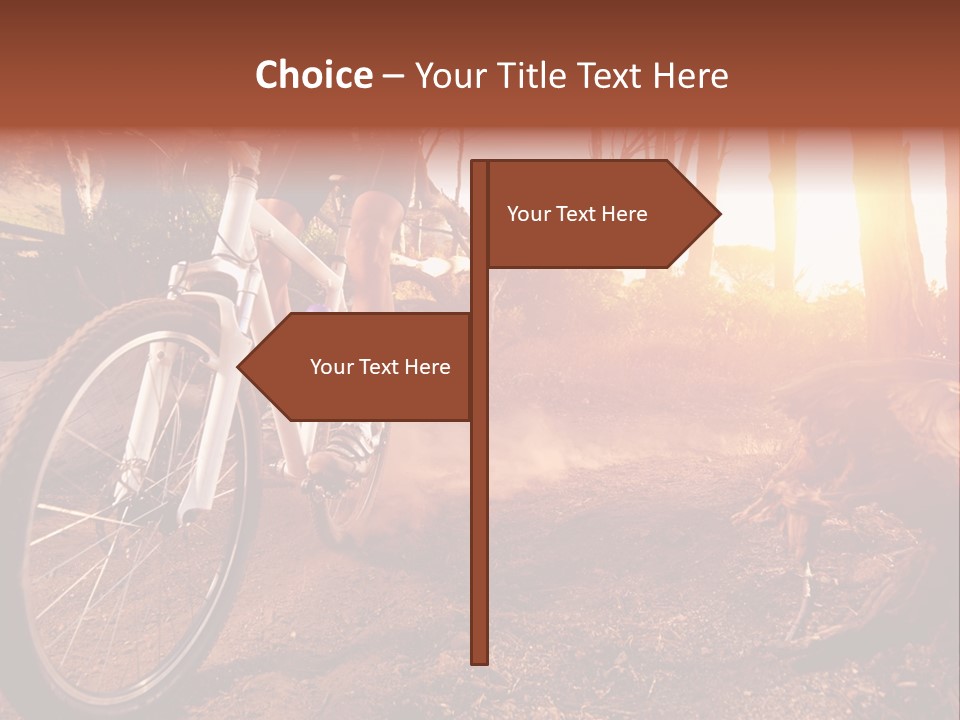 A Person Riding A Bike On A Dirt Road PowerPoint Template
