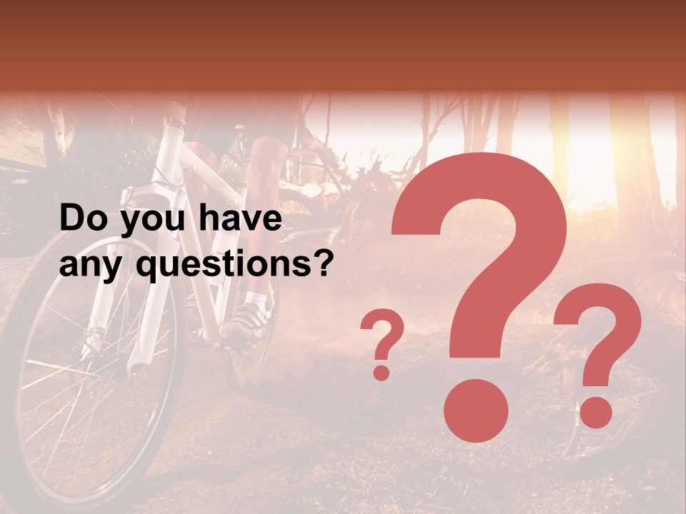 A Person Riding A Bike On A Dirt Road PowerPoint Template