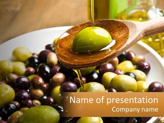 A Wooden Spoon Pouring Olives Into A Bowl Of Olives PowerPoint Template