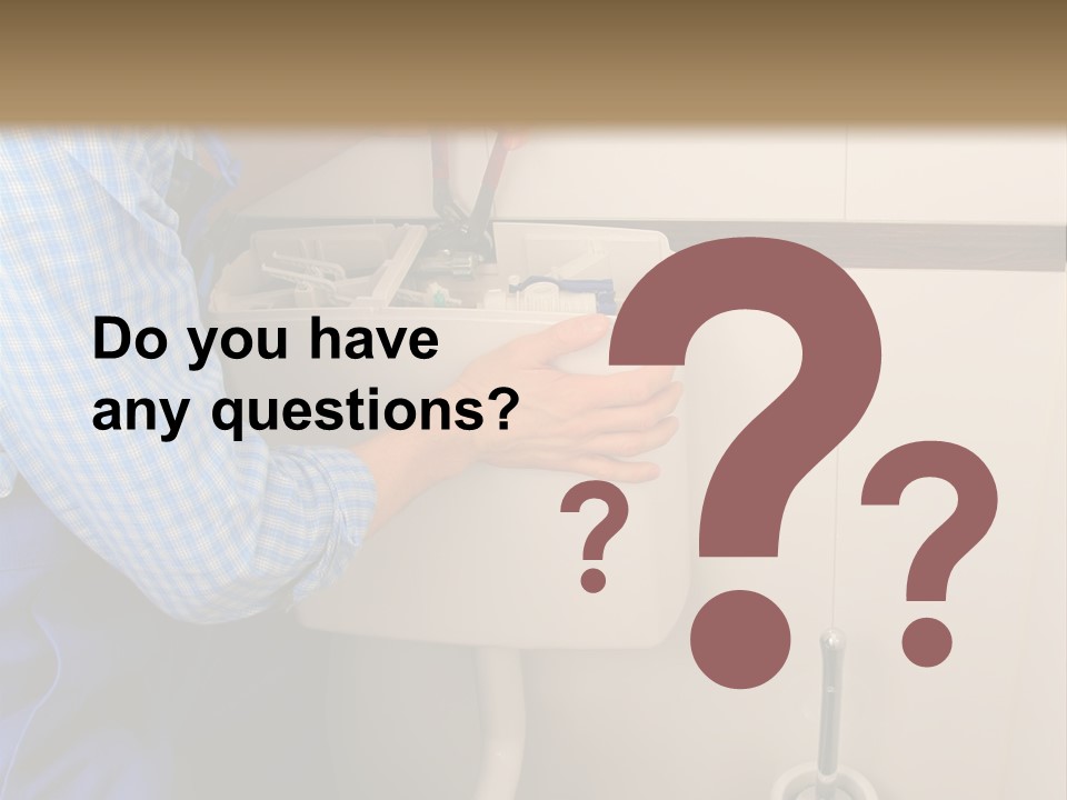 A Man Fixing A Toilet In A Bathroom PowerPoint Template