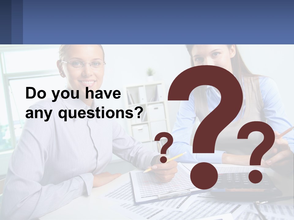Two Women Sitting At A Desk With A Calculator And Pen PowerPoint Template