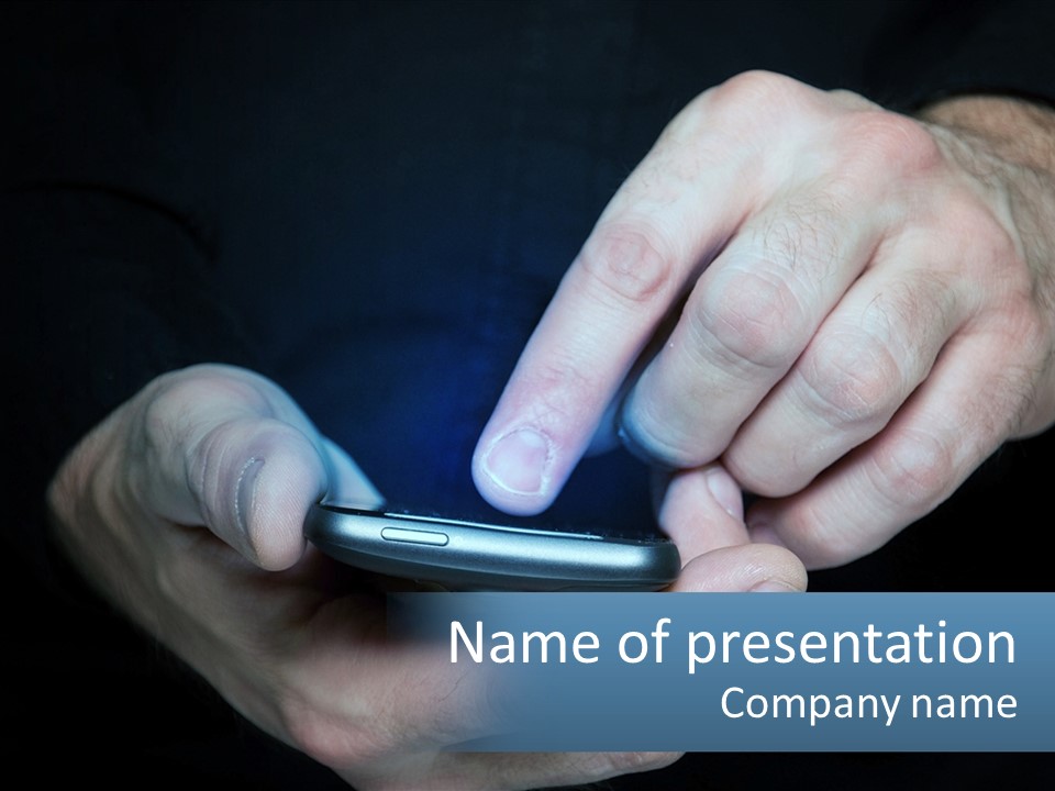 A Man Holding A Cell Phone In His Hand PowerPoint Template