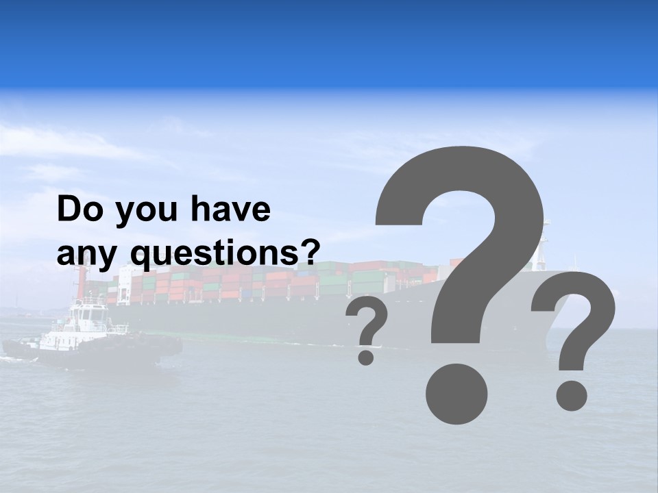 A Large Cargo Ship In The Ocean With A Tug Boat In Front Of It PowerPoint Template