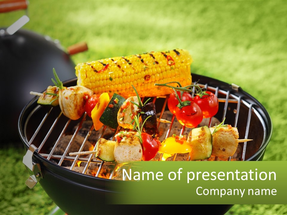 A Bbq Grill With Corn On The Cob And Vegetables On It PowerPoint Template