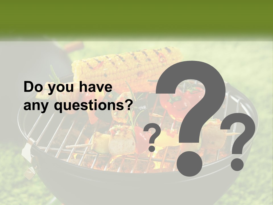 A Bbq Grill With Corn On The Cob And Vegetables On It PowerPoint Template